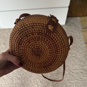 Round Woven Straw Crossbody Bag in Brown